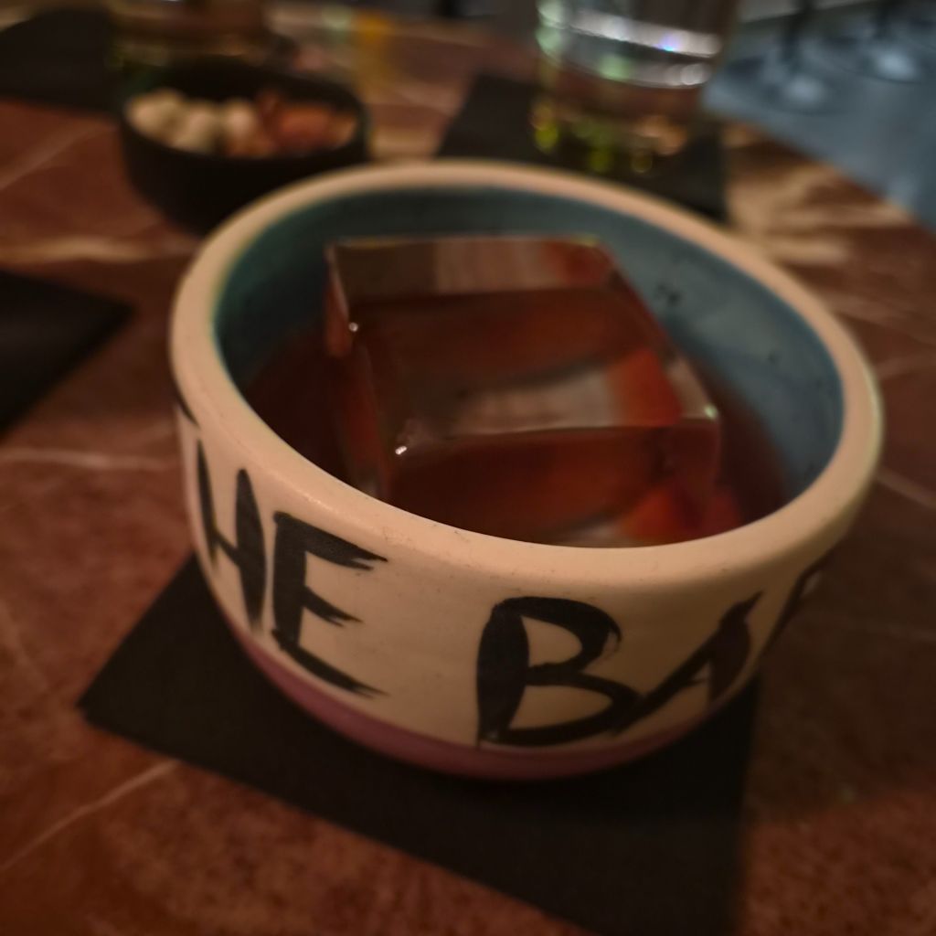 THE BAR IN FRONT OF THE BAR